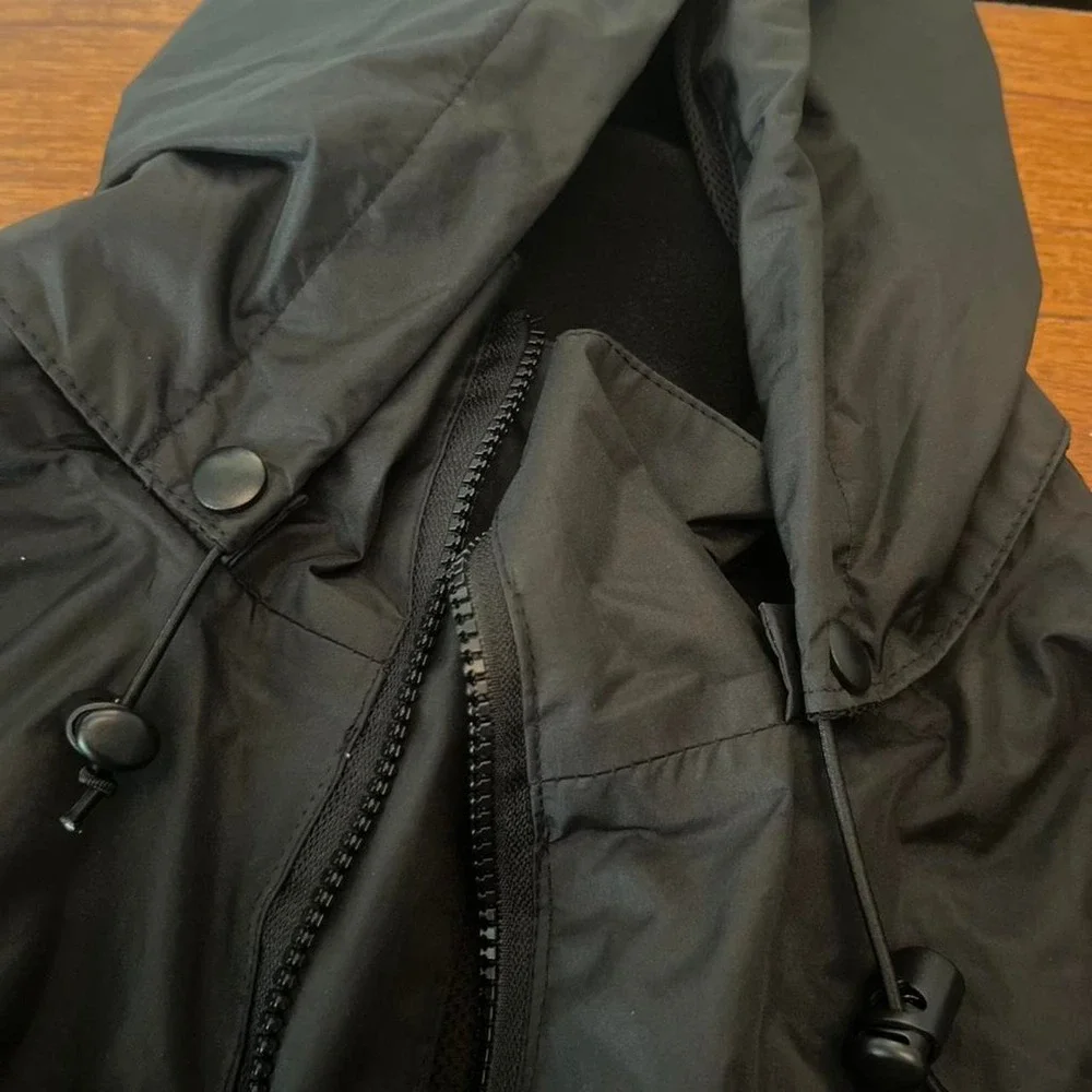 Black and grey waterproof jacket with removable hood